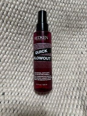 Redken Quick Blowout Heat Protecting Blow-Dry Primer. About 75% full.